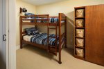 Twin bunk beds in the lower level - Note: The right side alcove door is decorative and does not close